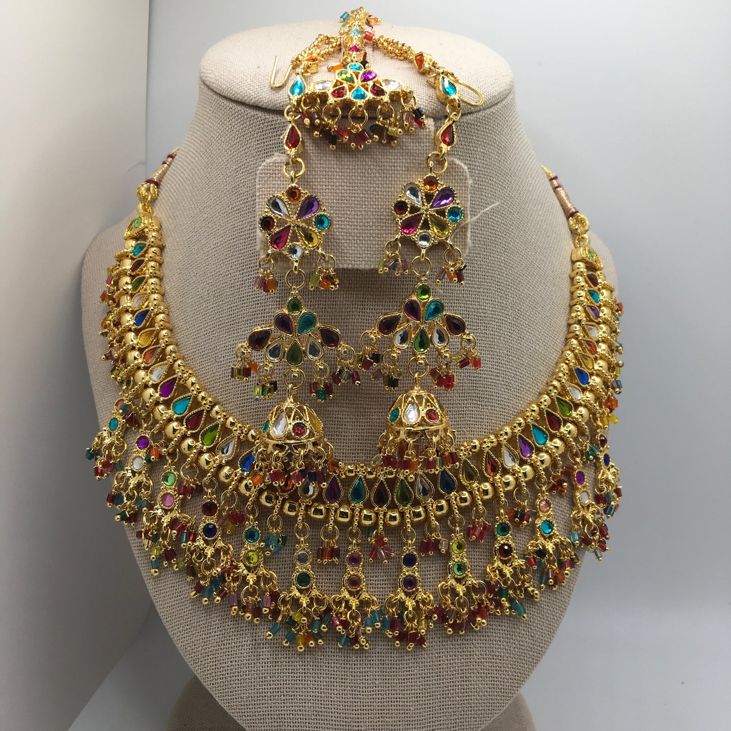 Gold Multicolored Necklace, Earrings & Tika Set