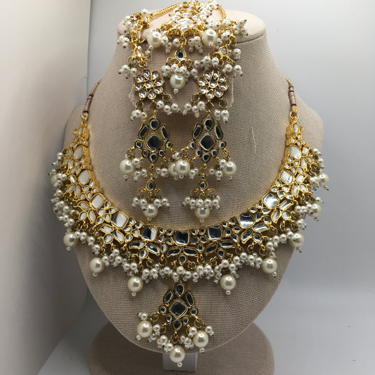 Beautiful Golden color and Pearl Necklace, Earrings & Tika Set