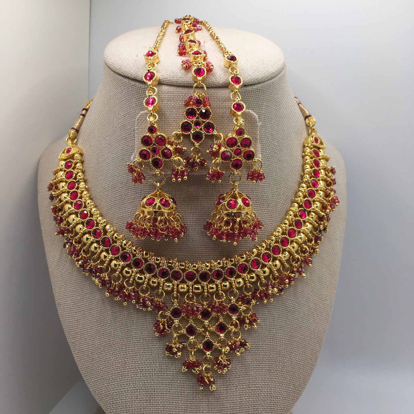 Pink and Golden color Necklace, Earring & Tika Set